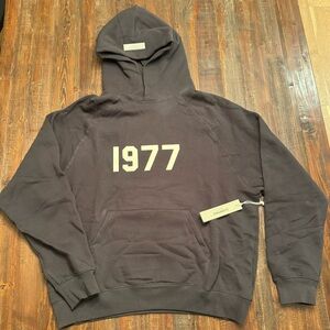 1977 brand new essentials hoodie size Large